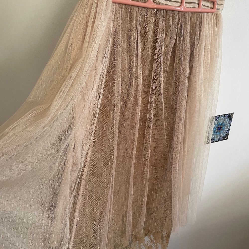 Lace skirt with layers of lace in shades of Gold.